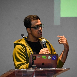 Jay Saadana speaking at a developer event